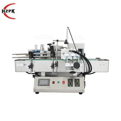 Care este compatibilitatea unei mașini de etichetat sticle rotunde cu diferit...